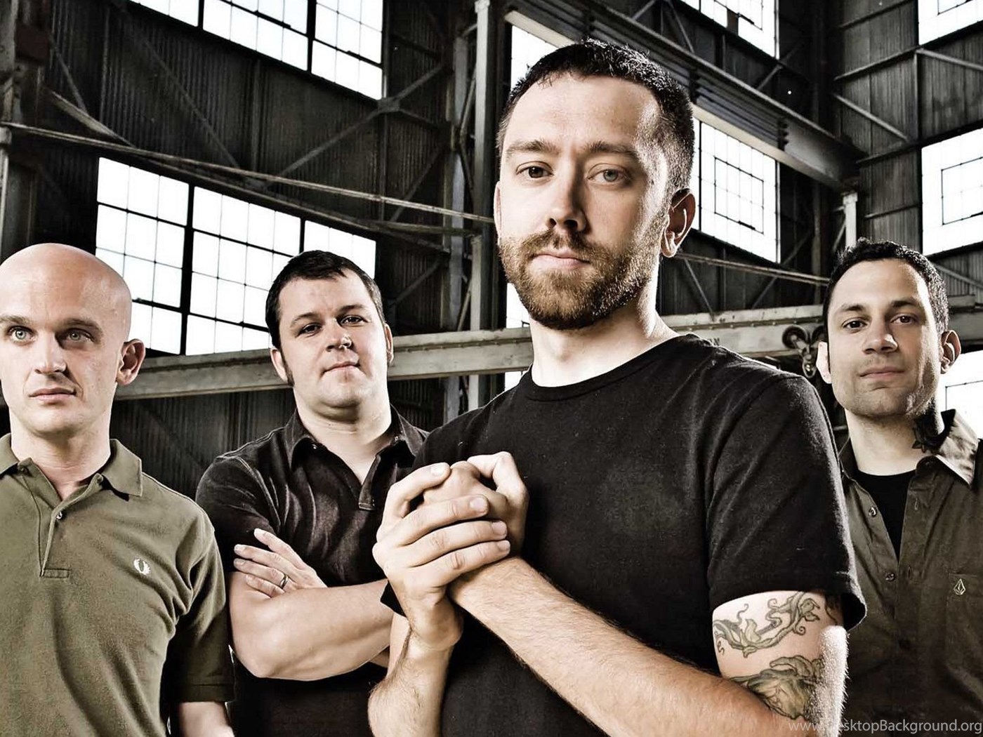 Impact band. Брэндон Барнс Rise against. Группа Rise against. Группа Rise against against 2022. Группа Rise against 2004.