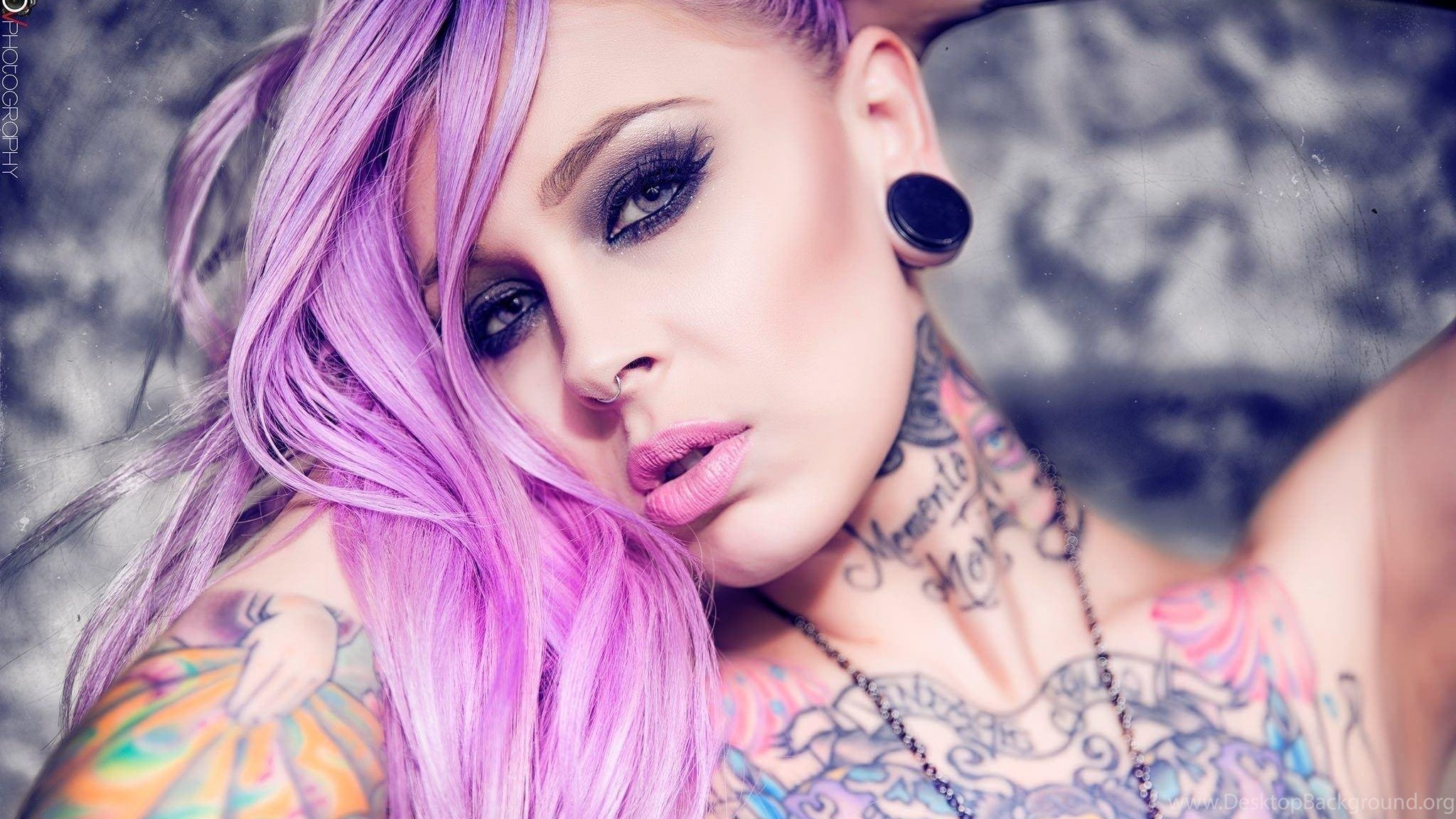 Premium Photo | The woman has a tattooed face and a pierced nose