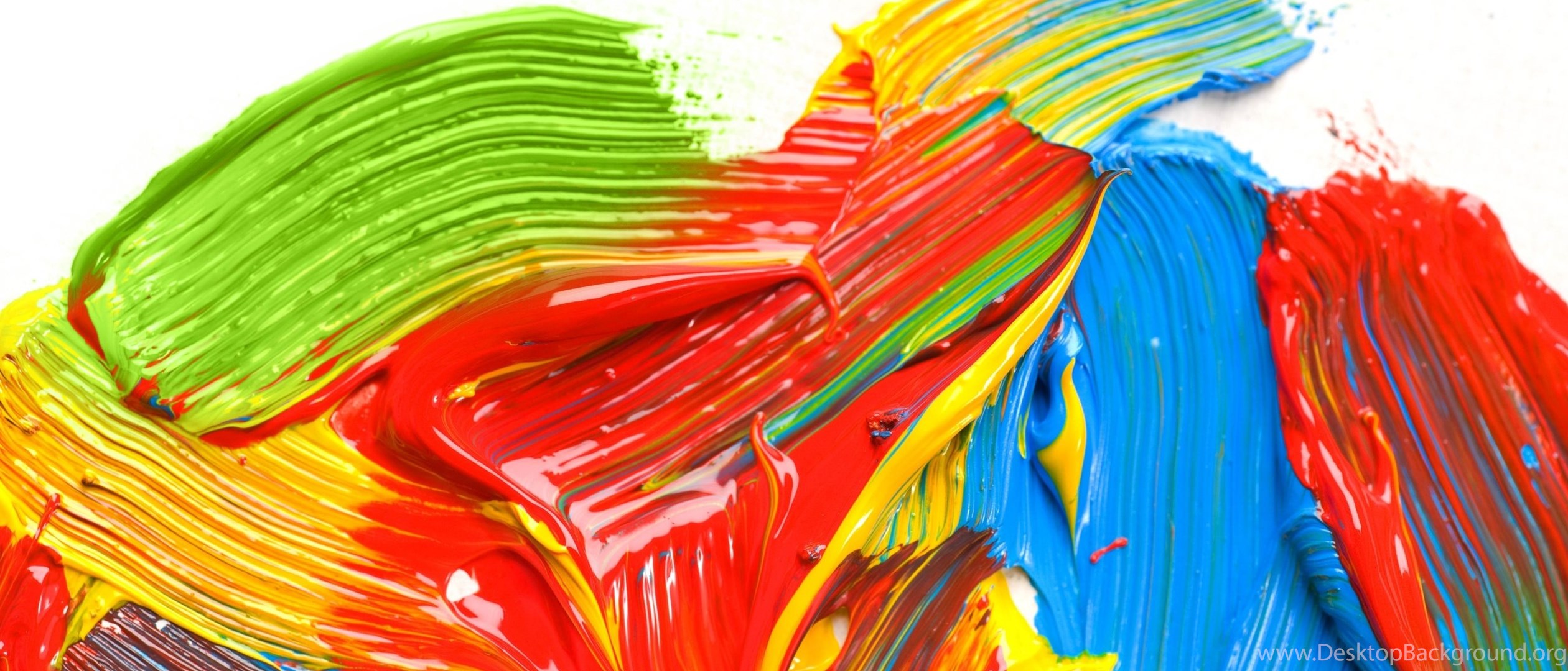 Яркие краски. Разноцветные разводы масляной краски. Яркие краски стекают. Мазки краской макро