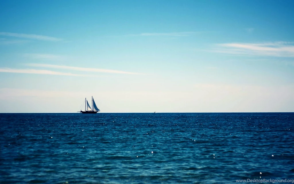 Boat Sailing In The Blue Sea Wallpapers