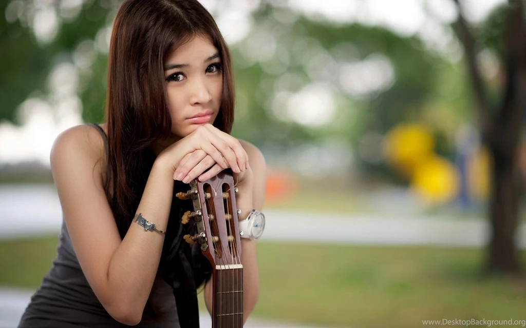 Sad Asian Girl With A Guitar HD Wallpapers