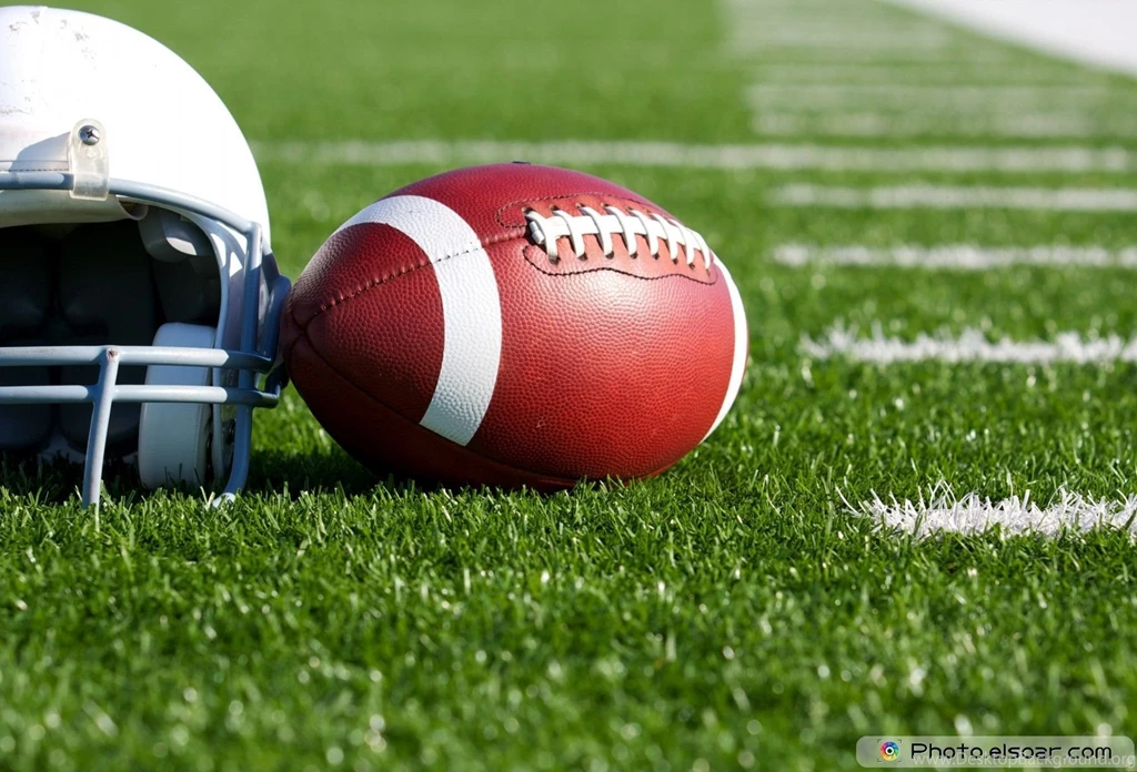 Football with Helmet on the Field.jpg