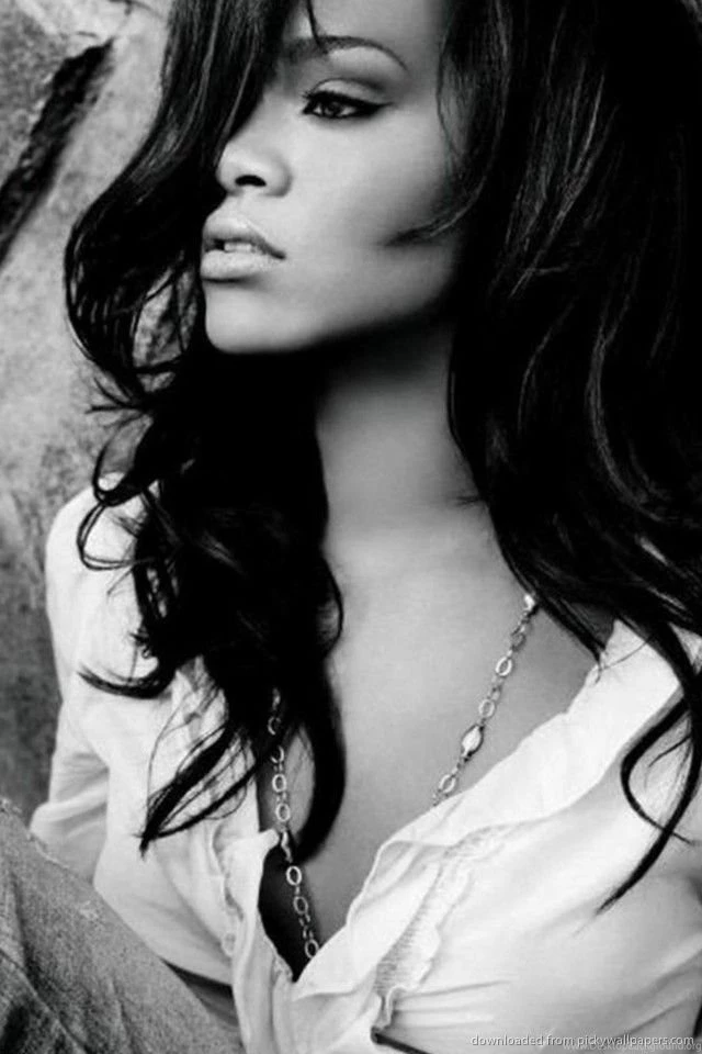 Download Rihanna Sitting Near The Wall Wallpapers For iPhone 4