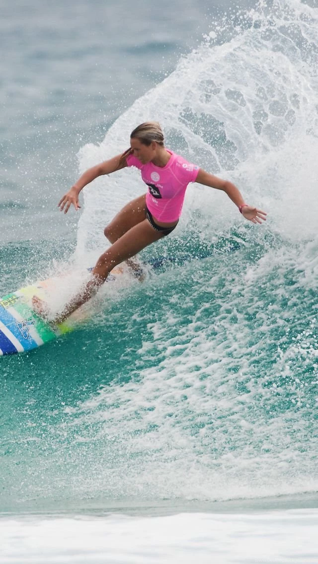 Girl In Pink T Shirt Surfing 640x1136.jpg