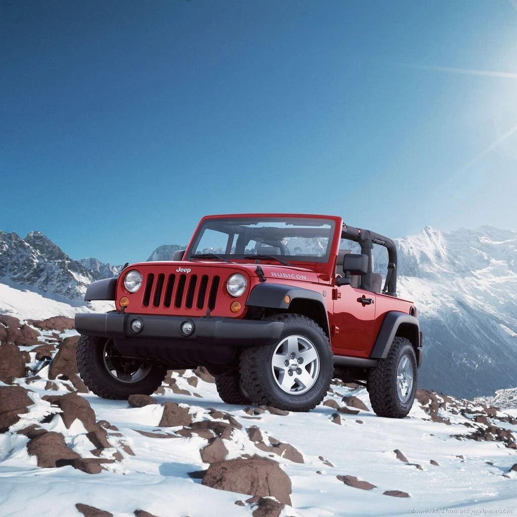 Download Red Jeep Wrangler In Snowy Mountains Wallpapers For iPad 2