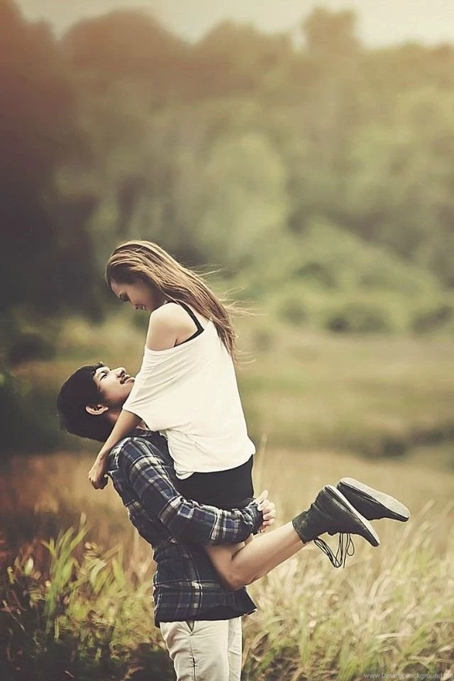 Romantic Couple In Fields 123mobileWallpapers.com