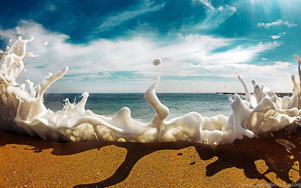 Sea Foam Crashes Over The Sand. : Pics