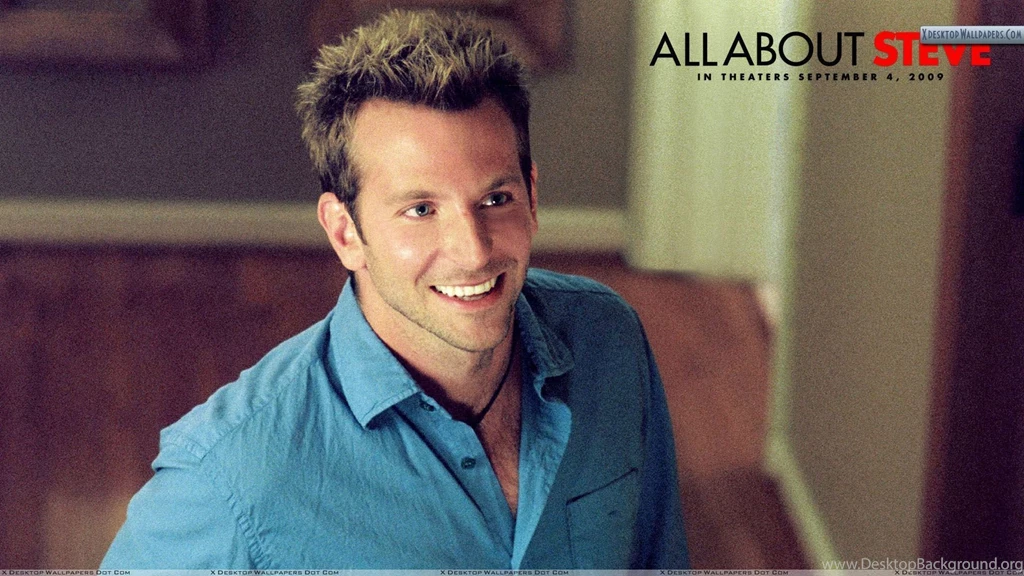 Bradley Cooper Smiling In Black Coat Outside Building Wallpapers