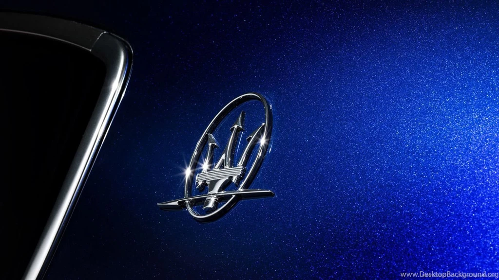 Download 1366x768 Blue Maserati Ghibli Logo Wallpapers