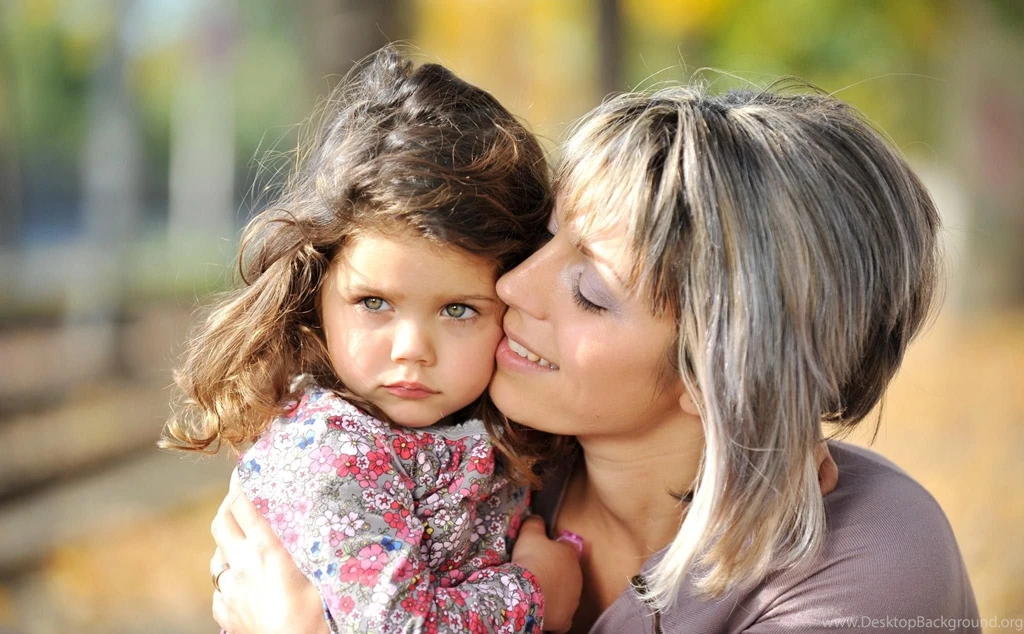 Sad baby with mother.jpg