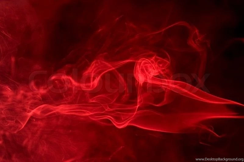 Abstract Backgrounds Showing Some Red Smoke In Black Back Stock Photo