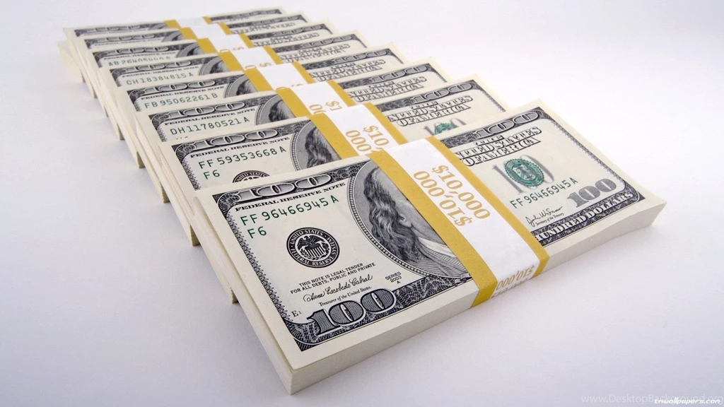 Row Of Stacks Of One Hundred Dollar Bills