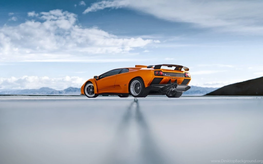 Orange Lamborghini Diablo On Snow Sports Car
