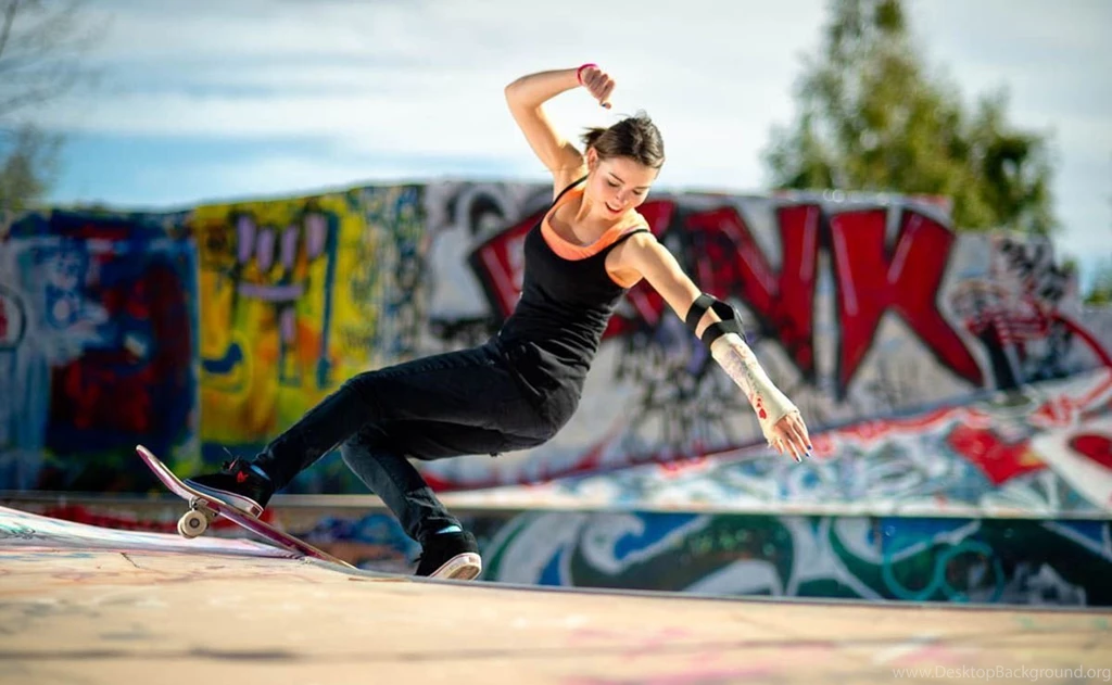 Skater girl skating on skate ground.jpg