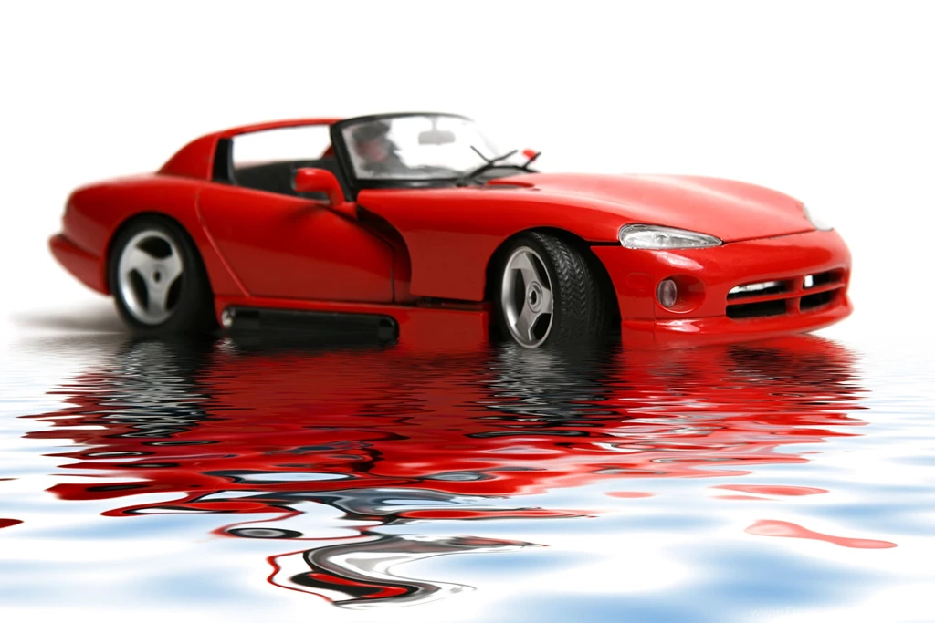 Red sports car white background background 1.jpg