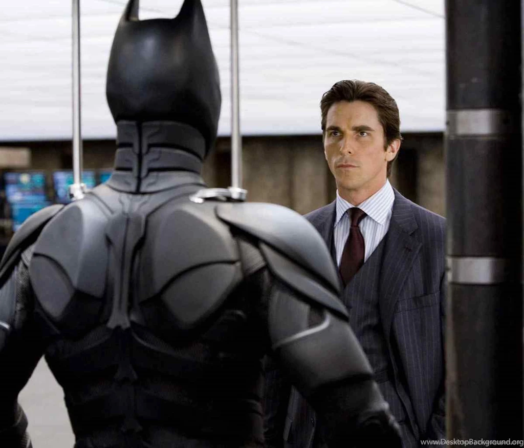 Download Bruce Wayne Looking At Batman Costume Wallpapers For ...