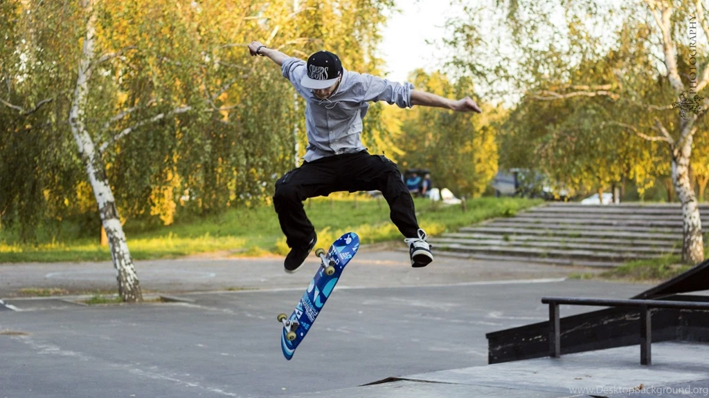 A Skater Jumping On A Blue Skateboard