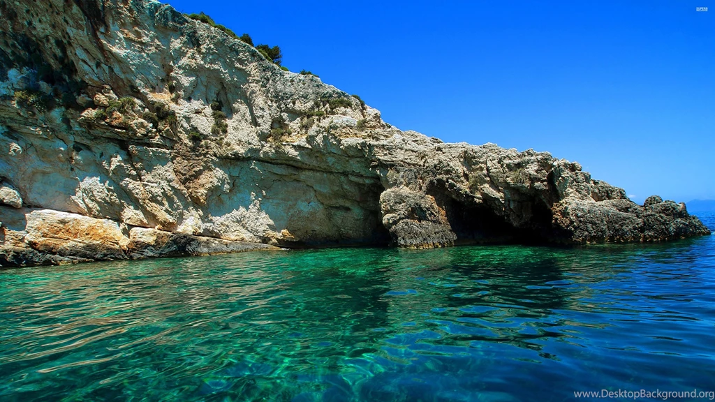 High Rocky Island In The Ocean Wallpapers Beach Wallpapers