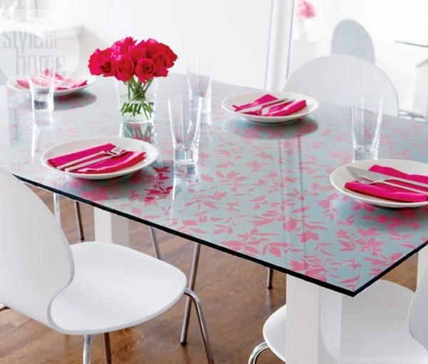 Glass dining room table with wallpaper top.jpg