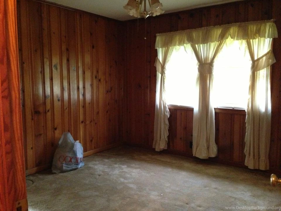 How To Decorate Around Dark Wood Paneling?
