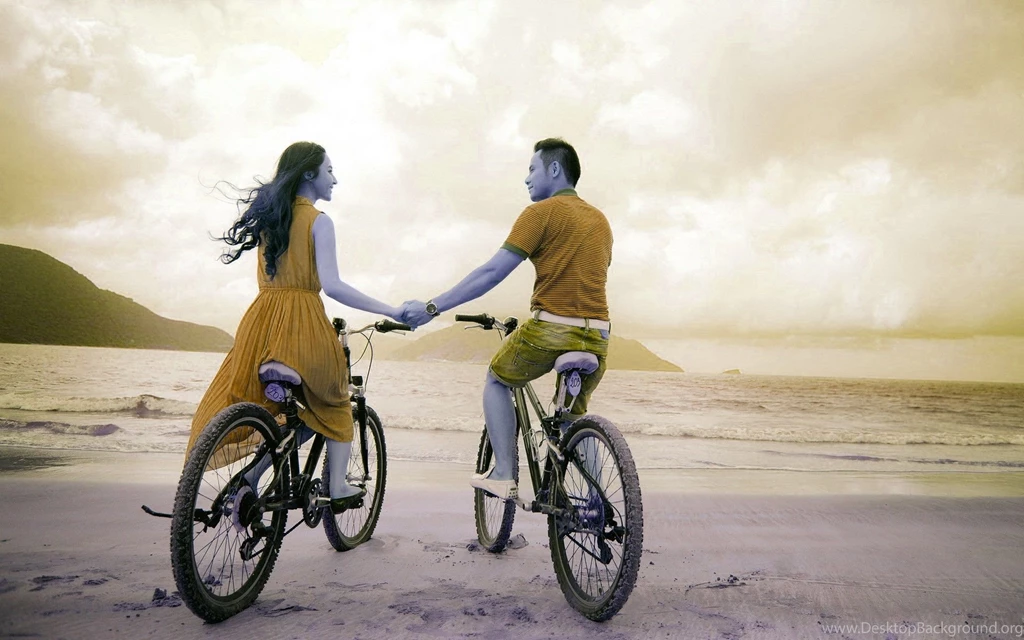 Beautiful Girl And Boy With Bicycle