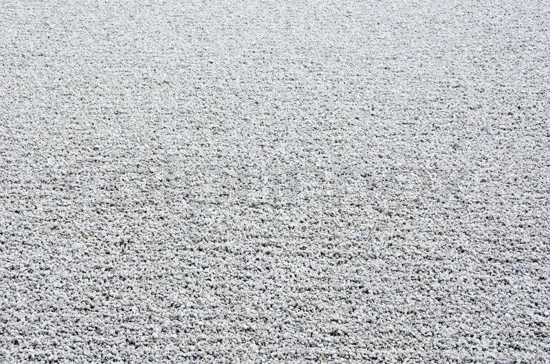 Backgrounds Of Gravel Arranged In Lines In A Stone Stock Photo