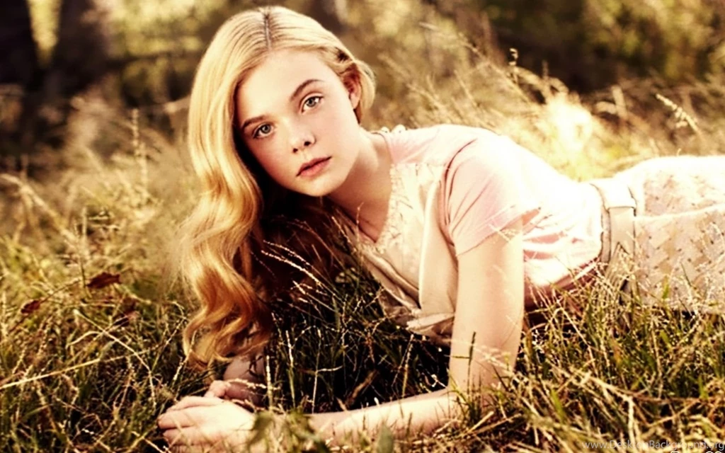 Elle Fanning On Grass Wallpapers.jpg
