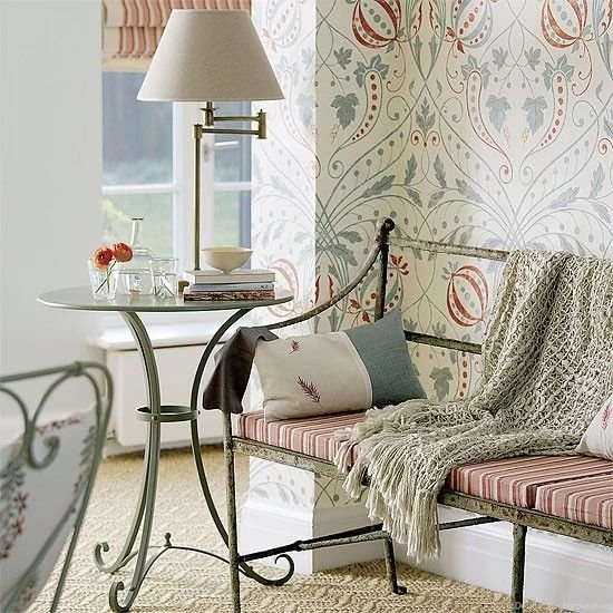 Garden Room Corner With Patterned Wallpaper, Iron Bench And Table ...