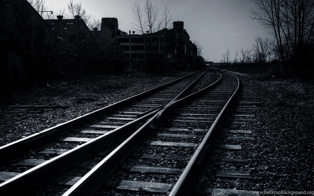 RAILROAD TRACKS ALONG INDUSTRIAL AREA WALLPAPER (