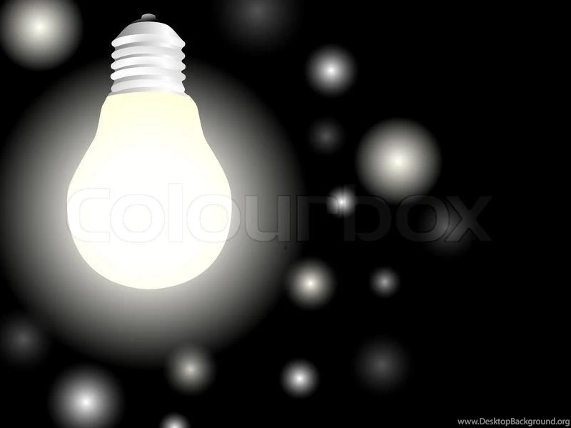 Light Bulb With Glowworms Over Black Backgrounds Stock Photo