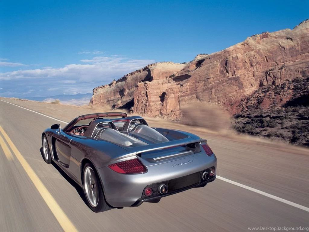 2004 Porsche Carrera GT Rear Angle Speed 1024x768 Wallpapers