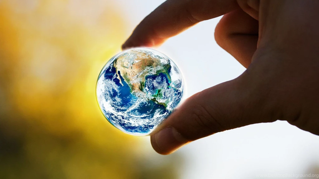 Globe In The Fingers Wallpapers And Images Wallpapers, Pictures ...