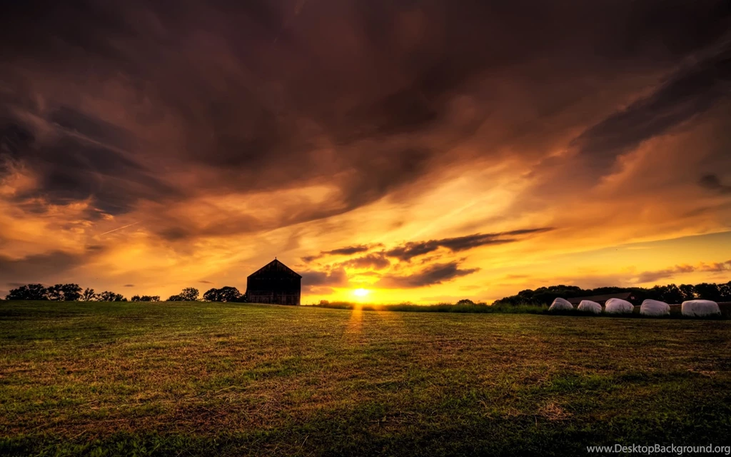 Old Farm House In The Field At Sunset