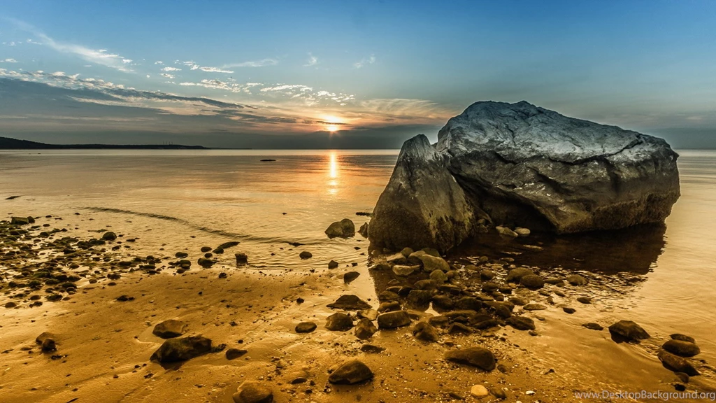 Sunset on a large rock on a beach hd wallpaper 491365.jpg