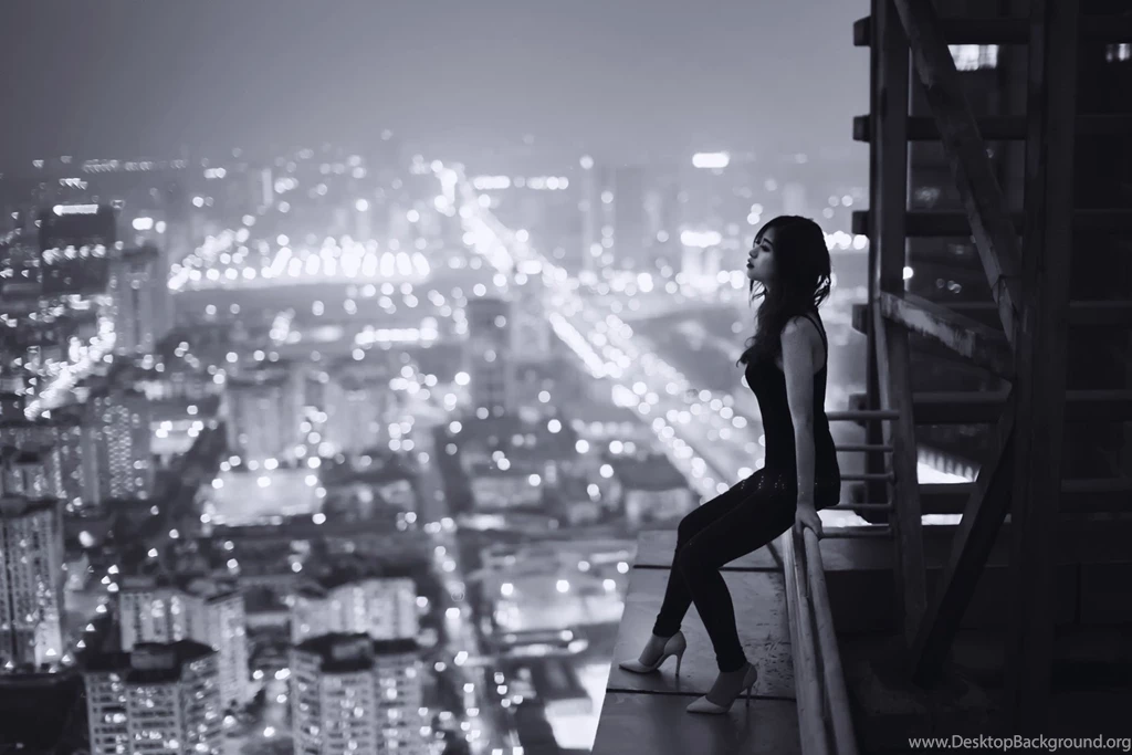Sad girl on top of building.jpg