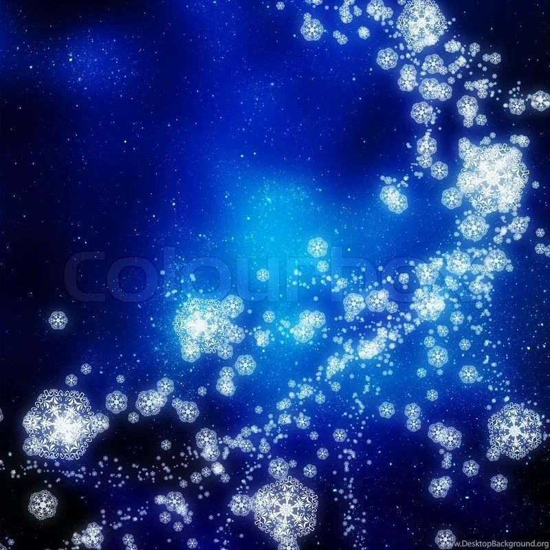 Snowflakes Falling On The Backgrounds Of Blue Luminous Rays