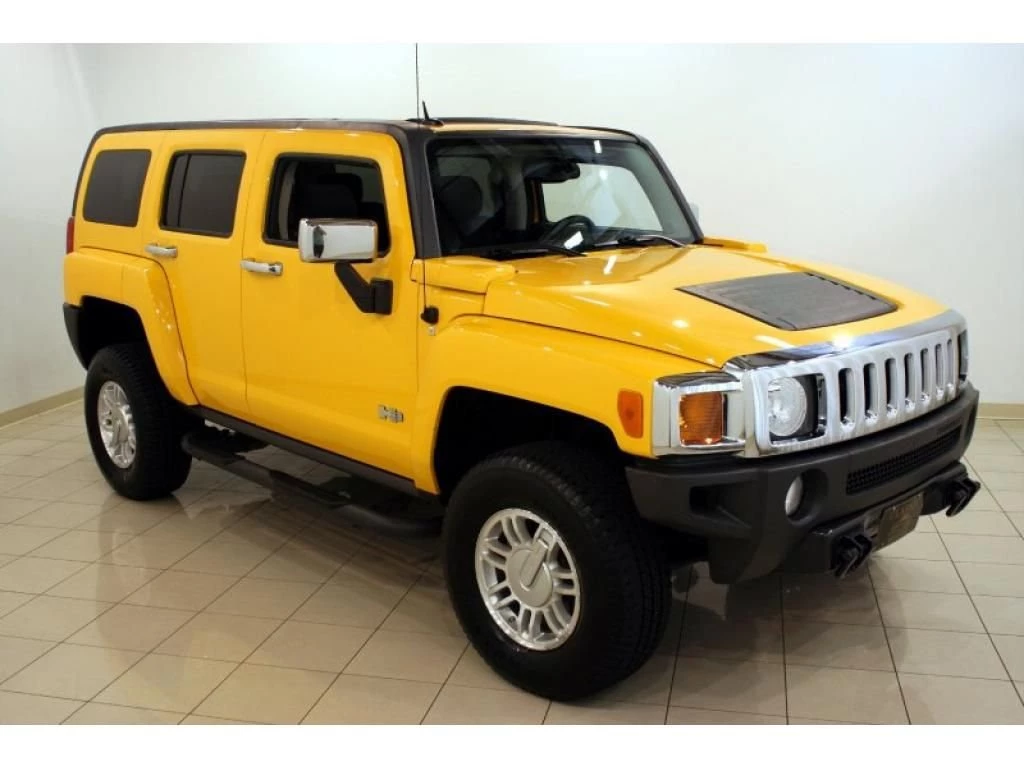 Hummer H2 Lifted Yellow Image