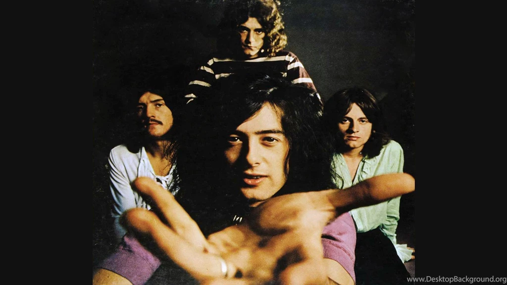 Classic led zeppelin wallpaper with jimmy page in front.jpg