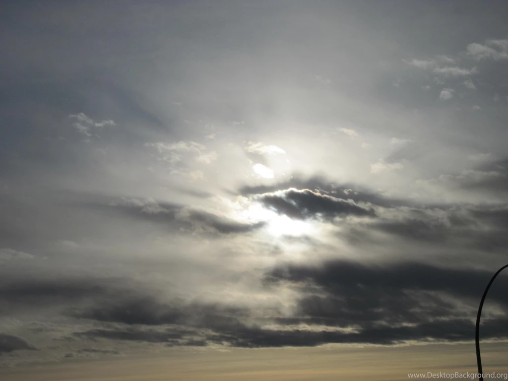 SUN BEHIND THE CLOUDS WALLPAPER (