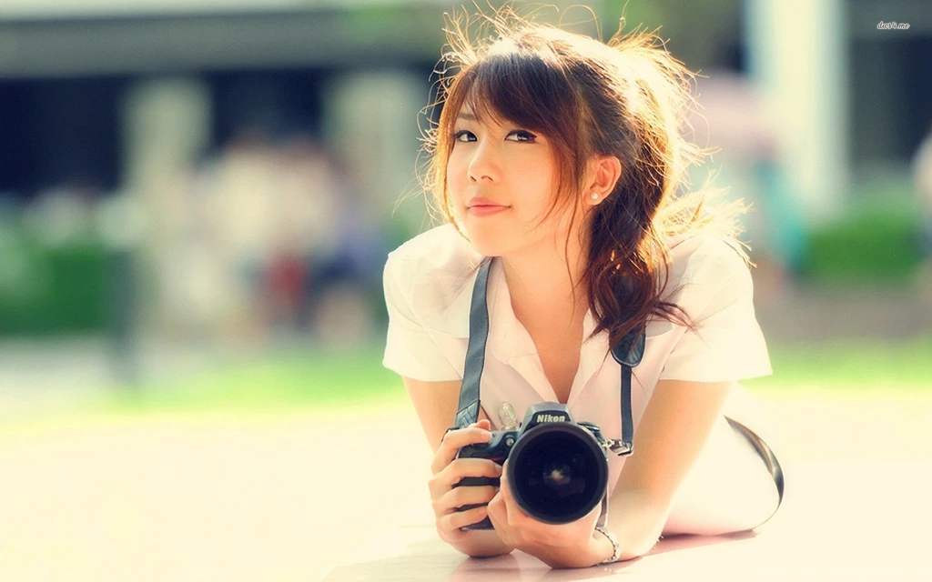 Girl With A Nikom Camera Wallpapers