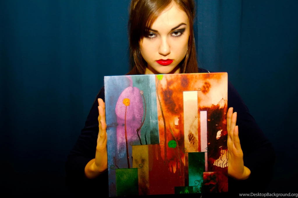 Download Sasha Grey Holding A Painting Wallpaper Backgrounds