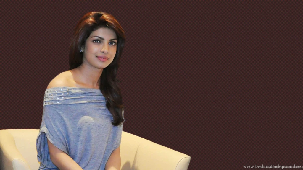 HD Priyanka Chopra In White Chair Wallpapers