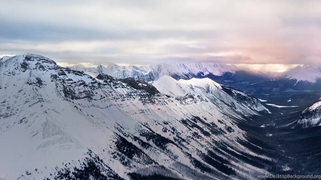 Snowy Mountain Range Distant Storm 4K Desktop Wallpapers