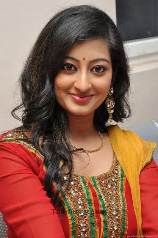 Actress Tejaswini New Cute Photos In Red Dress