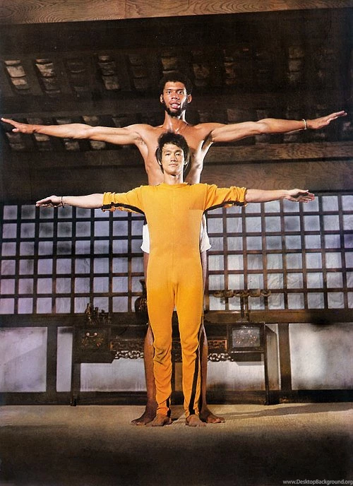 Bruce Lee Kicking Kareem Abdul Jabbar In The Head Wallpaper.