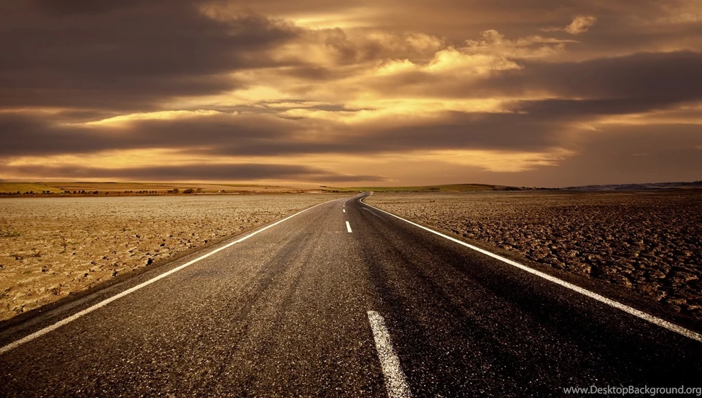 Empty Road At Sunset
