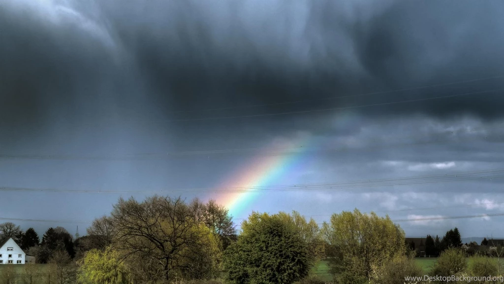 Rainbow Through Rain Clouds (