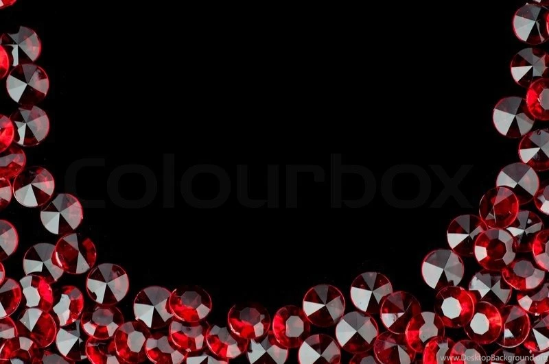 The Red Crystal On A Black Backgrounds Stock Photo