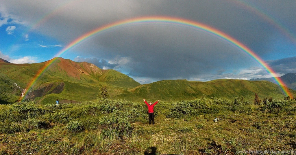 People Enjoy Natural Double Rainbows
