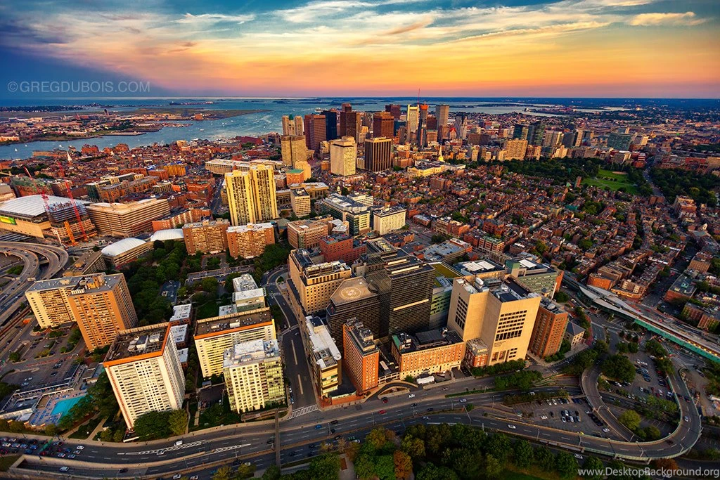 Aerial View Of Boston Skyline At Sunset From Helicopter With West ...